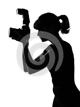 Silhouette woman photographer