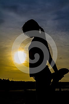 Silhouette of Woman Practicing Yoga