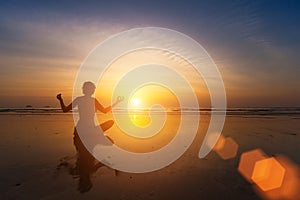 Silhouette of woman practicing yoga