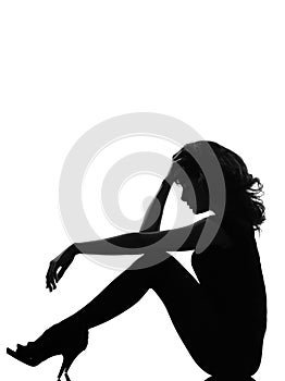 Silhouette woman sitting sad pensive
