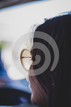 Silhouette of a woman in sunglasses with copy space and bokeh background