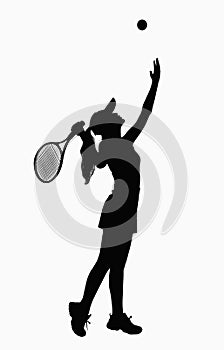 Silhouette of woman with tennis racket, serving.