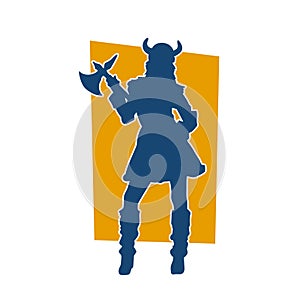 Silhouette of a woman viking fighter character in action pose with armor suit and axe weapon.