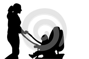 Silhouette woman walking with baby buggy