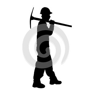 silhouette of a worker holding his mattock tool.