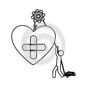 Silhouette worker with pulley holding heart band aid in cross form