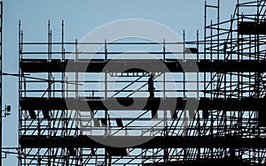 silhouette of worker at scaffolding, Construction site and scaffolding silhouette