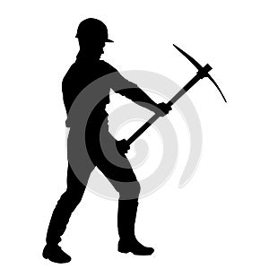silhouette of a worker swinging his mattock tool.