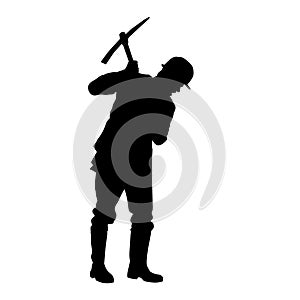 silhouette of a worker swinging his mattock tool.