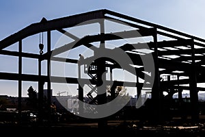 Silhouette of the workers dissembling