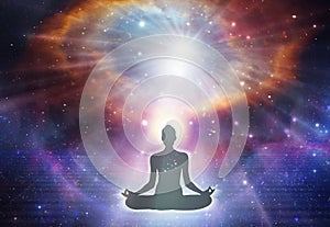 Silhouette yoga meditation, universe, nebula, healing, human body energy beams photo