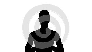 Silhouette Yoga smiling woman with hands coupled.