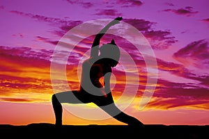 Silhouette yoga woman lunge one arm up