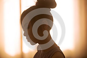 Silhouette of young asian woman