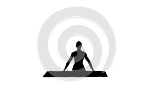 Silhouette Young attractive woman practicing yoga, sitting in Go
