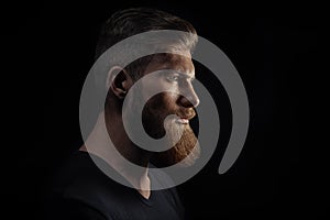 Silhouette of young bearded man hipster