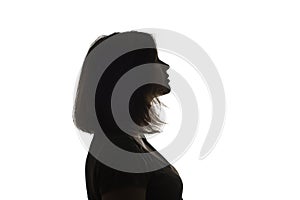 Silhouette of young black woman thinking something