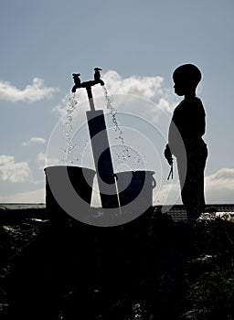 Silhouette of young boy in Langa