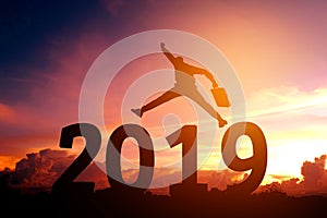 Silhouette young Business man happy to 2019 new year