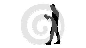 Silhouette Young confused man trying to read smart book misunderstanding content while walking.