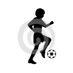 Silhouette young footballer playing football