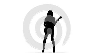 Silhouette of a young girl playing dancing on