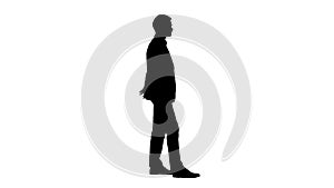 Silhouette Young handsome businessman standing and waiting.