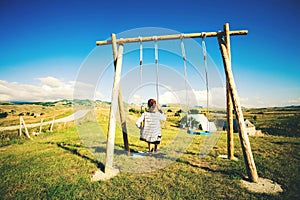 Silhouette Of A Young Happy Woman On A Swing, Swinging Over The Andes Mountains, Tree House, Montenegro, Durmitor National Park