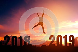 Silhouette young man happy to 2019 new year