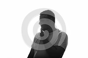 Silhouette of young man portrait with hand on studio isolated white background. Close up