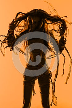 Silhouette of young mummy woman in bandage