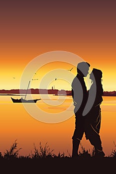 Silhouette of young romantic couple on sunset background