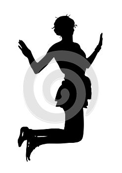 Silhouette of a young  slender  skinny girl who is having fun jumping up