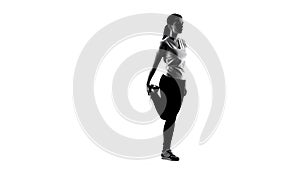 Silhouette of young woman making yoga exercises and meditating, sport healthcare