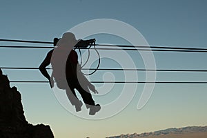 Silhouette of a zipline over Bootleg Canyon, Boulder City photo