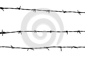 Silhouetted barbed wire