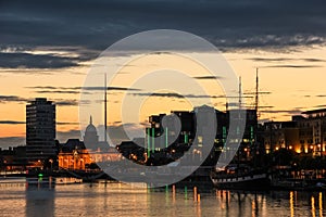 Silhouetted buildings over the Liffey. Dubln. Ireland