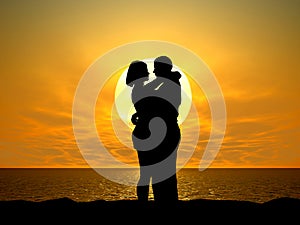 Silhouetted couple at sunset