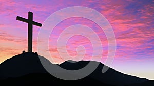 Silhouetted cross on hillside