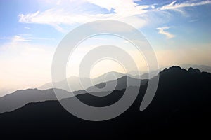 Silhouetted mountains and sky