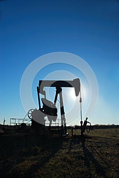 Silhouetted oil pump jack