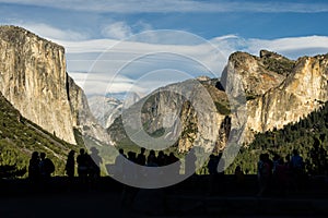 Silhouetted people and mountains