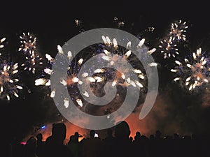 Silhouetted People Watching a Beautiful Fireworks Display