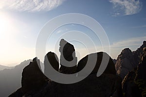 Silhouetted rocks on mountain