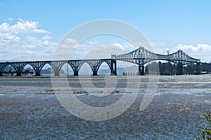 Silhouetted view of the McCullough Memorial Bridge near North Bend, Oregon, USA