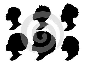 Silhouettes of African Americans. A set of womens profile silhouettes. Hair contour. Vector