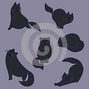 Silhouettes of black cats on a gray background