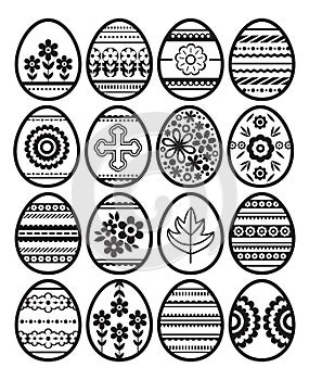 Silhouettes of black Easter eggs isolated on white background. Holiday Easter Eggs decorated with flowers and leafs. Print design