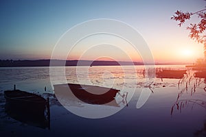 Silhouettes of boats during beautiful sunset