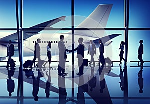 Silhouettes of Business People on an Airport